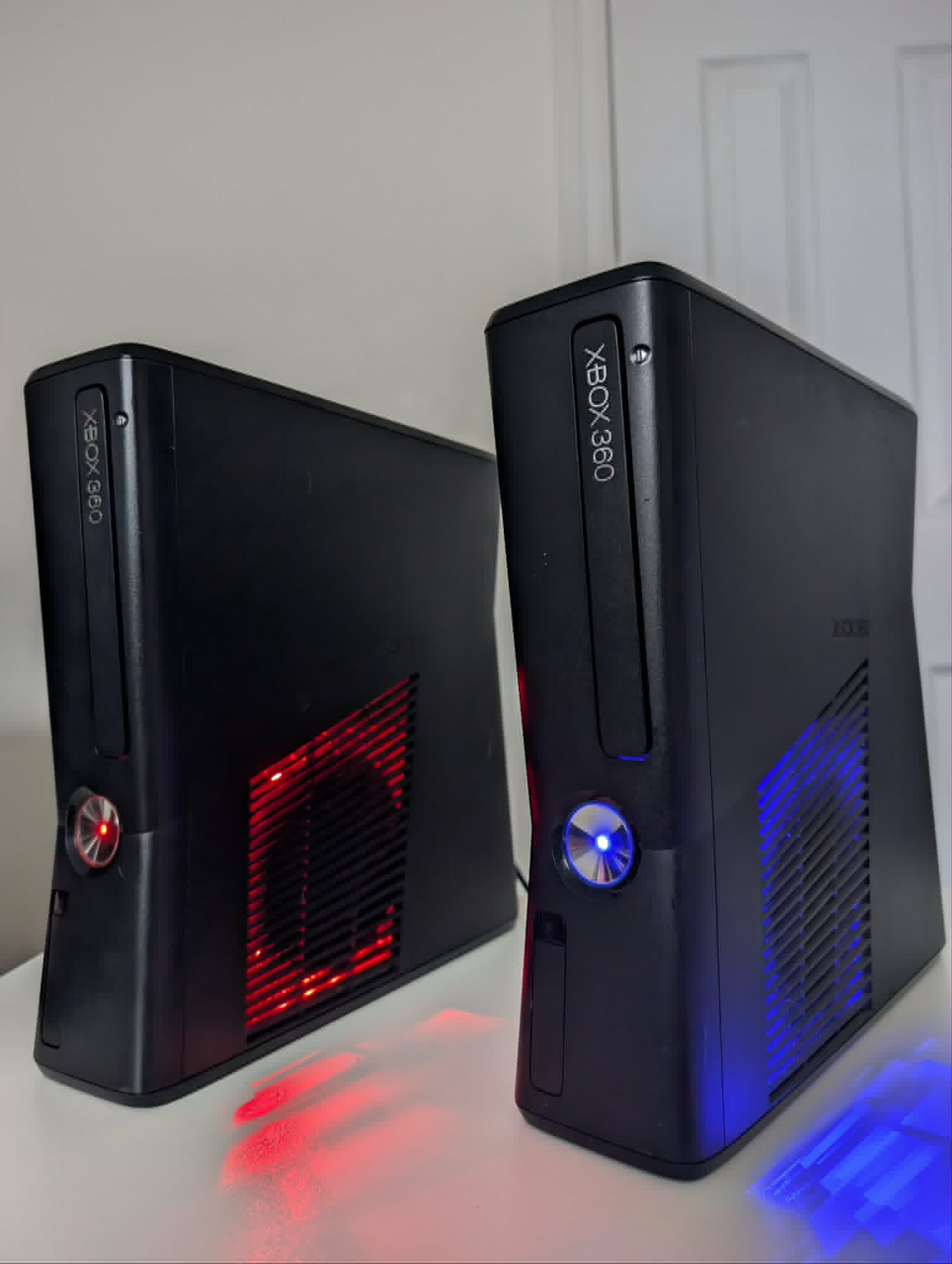 Modded consoles with red and blue LEDs